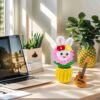 Beautiful little white rabbit hand-crocheted desktop ornament, smiling little rabbit home decoration, small potted artificial flower plant, desktop home car dashboard decoration