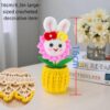 Beautiful little white rabbit hand-crocheted desktop ornament, smiling little rabbit home decoration, small potted artificial flower plant, desktop home car dashboard decoration